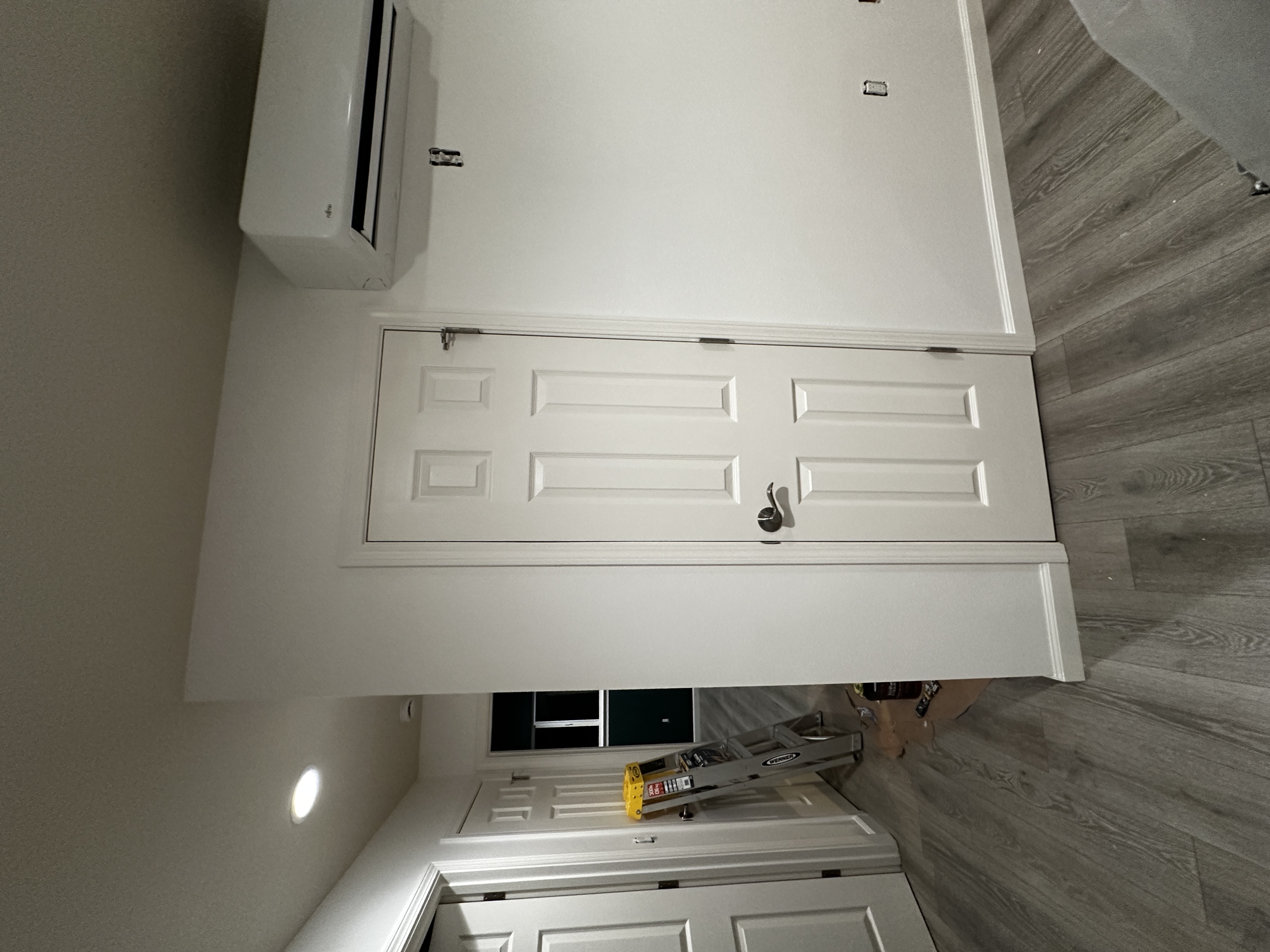 Renovated room with fresh white paint